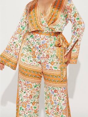 Fashion Nova Orange Floral Wrap Jumpsuit